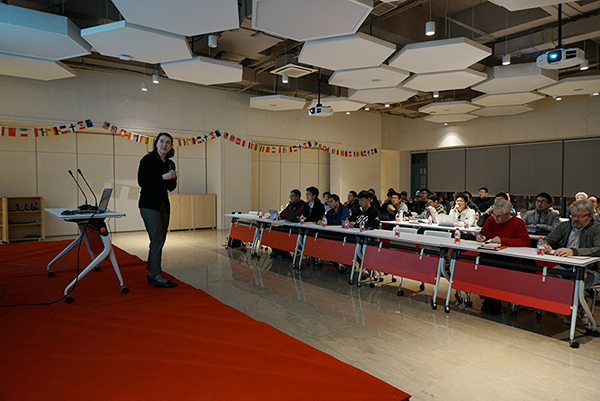 Image of faculty member teaching and students in lecture hall at Zhejiang University-University of Illinois, Urbana-Champaign Institute in Haining, China.